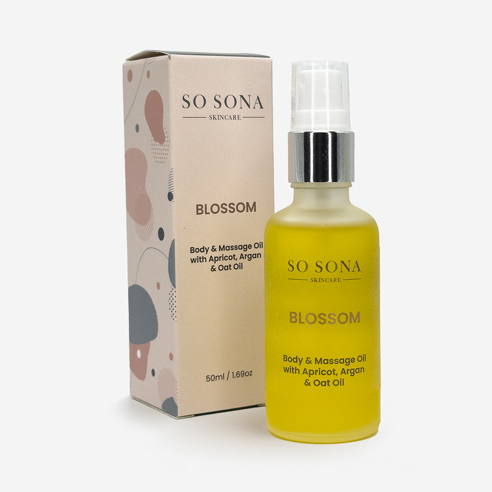blossom massage oil with packaging on white background