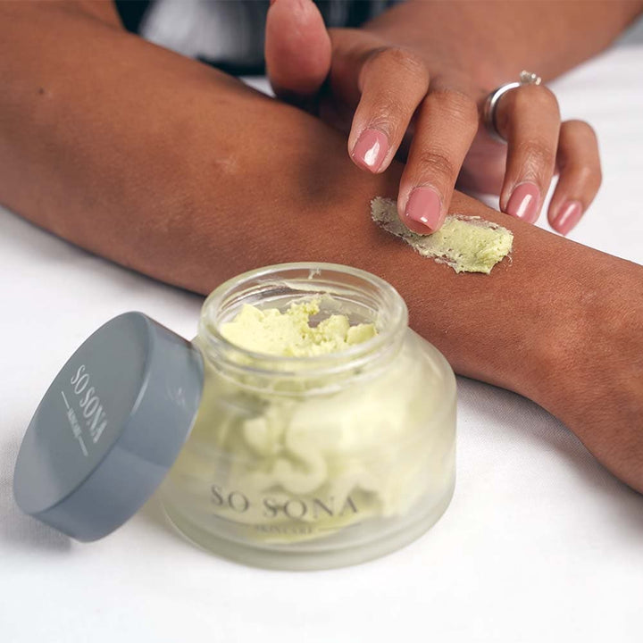 Applying Evergreen cream on skin