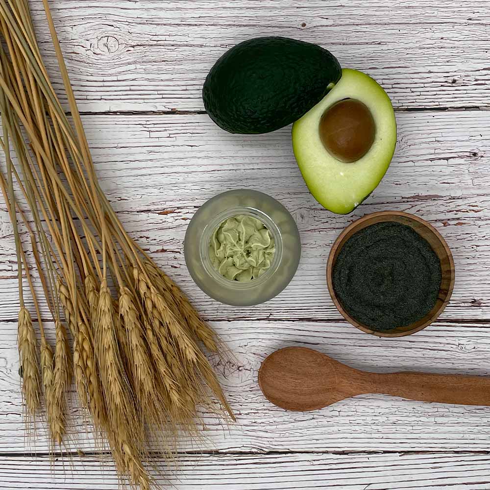 Evergreen body butter top view with avocado, oat and spirilina powder