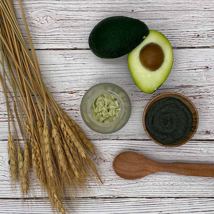Evergreen body butter top view with avocado, oat and spirilina powder
